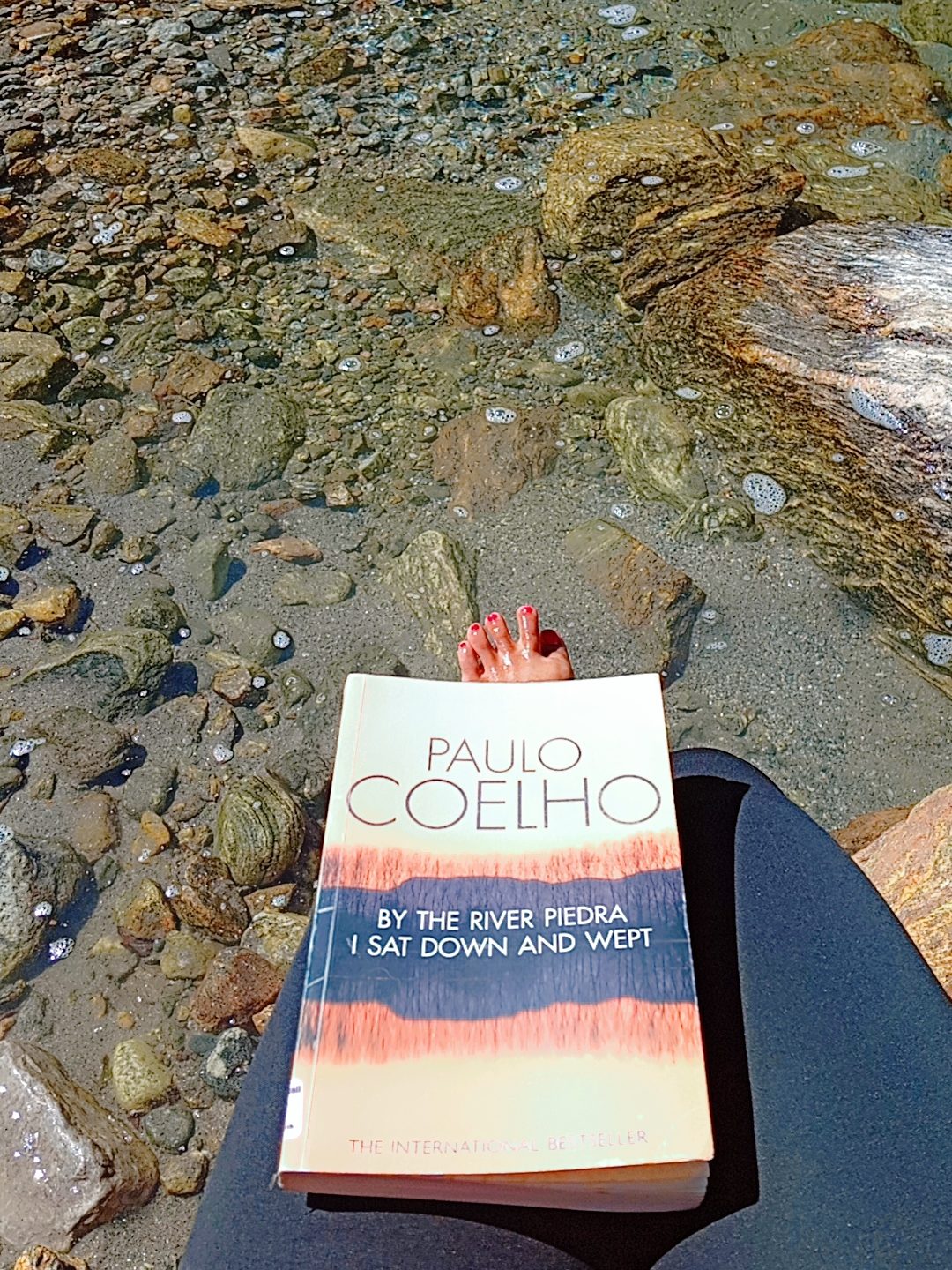 A photo of Paulo Coelho's 'By the River Piedra I Sat Down and Wept'