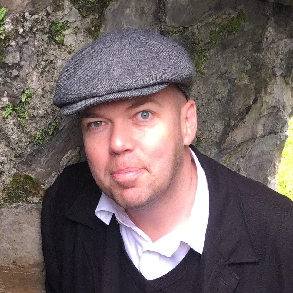 A photograph of Tim Conley.