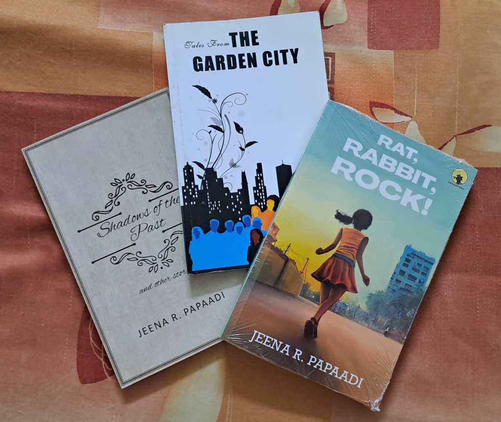 A photograph of 3 books of Jeena R. Papaadi.
