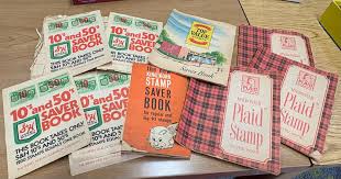 A photograph of S&H Green Stamp Books. 